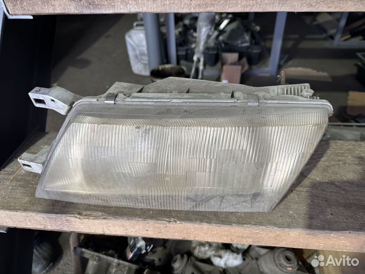 Фара левая Nissan Sunny 14