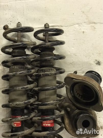 Задние стойки митсубиши lancer 10 седан