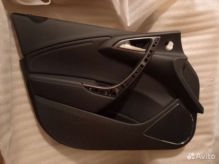 Обивка двери передней левой opel astra j