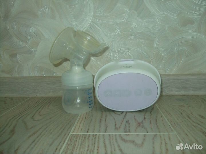 Электрический молокоотсос