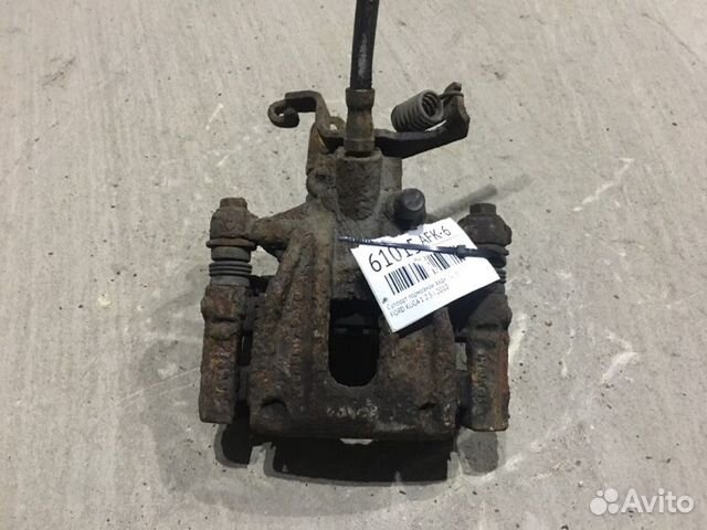 Суппорт тормозной задний правый Ford Kuga 1 2.5 I