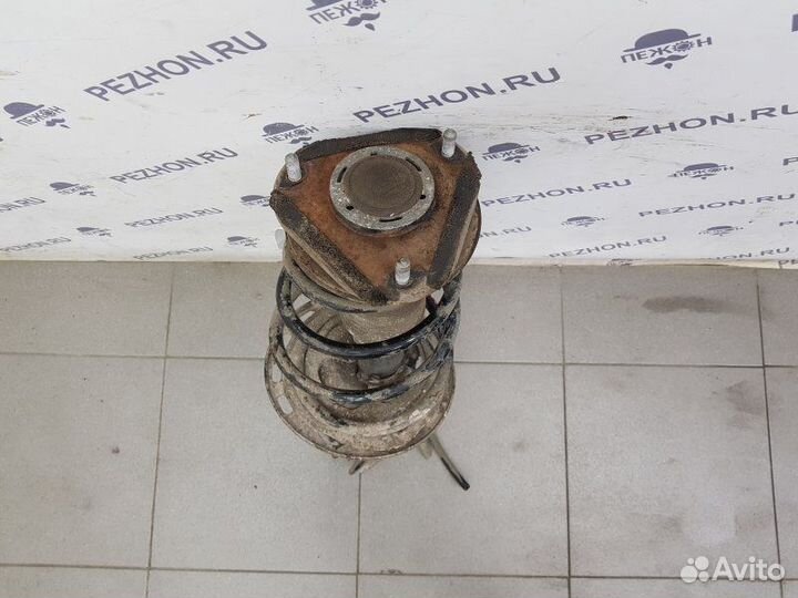 Амортизатор передний левый Toyota Avensis