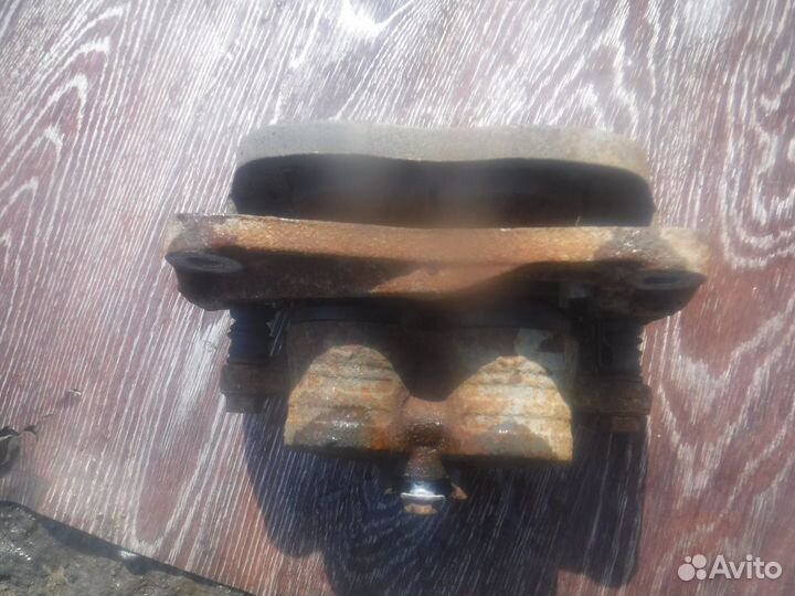 Суппорт передний Subaru Impreza (G12) 2007-2012