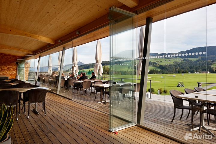 Классическое безрамное остекление веранды