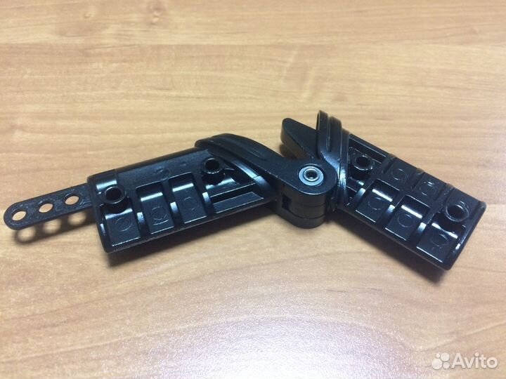 Механизм складывания рамы коляски