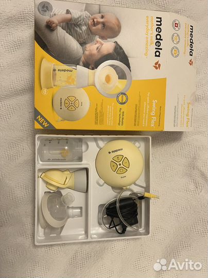 Молокоотсос medela swing flex электрический