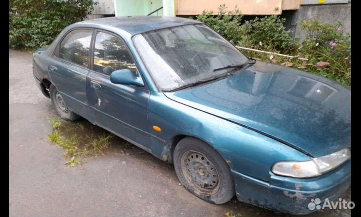 Запчасти крылья Mazda 626