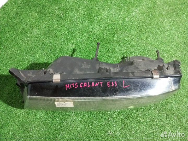 Фара галогеновая левая Mitsubishi Galant E33A