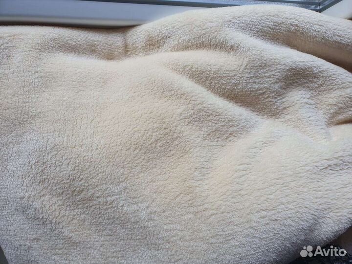 Пледы и подушки