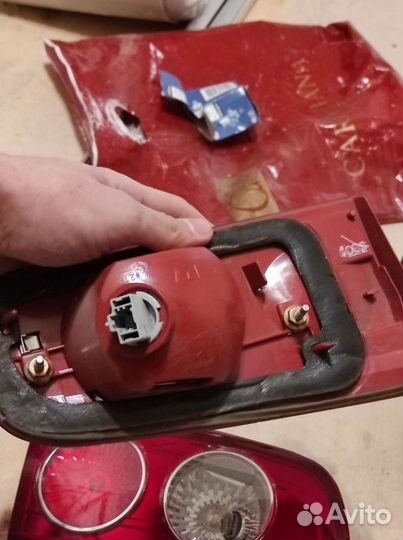 Фонарь задний / стоп сигнал запчасти Mazda Demio