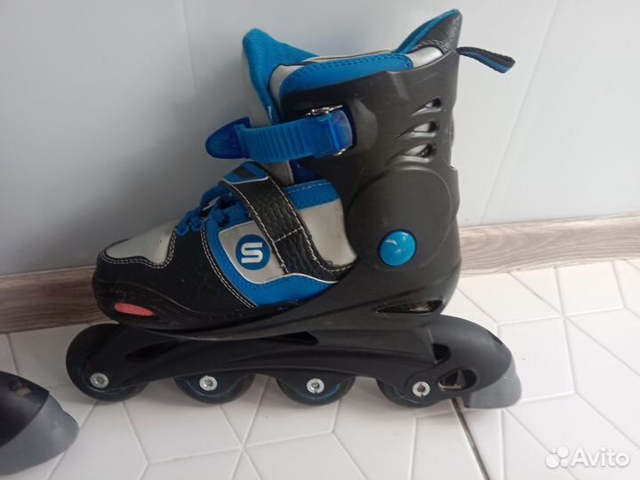Роликовые раздвижные коньки