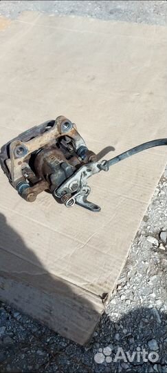 Тормозной суппорт задний Skoda Октавия 1.8tsi 152л