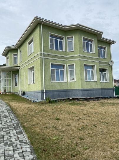 Коттедж 309,8 м² на участке 14 сот.