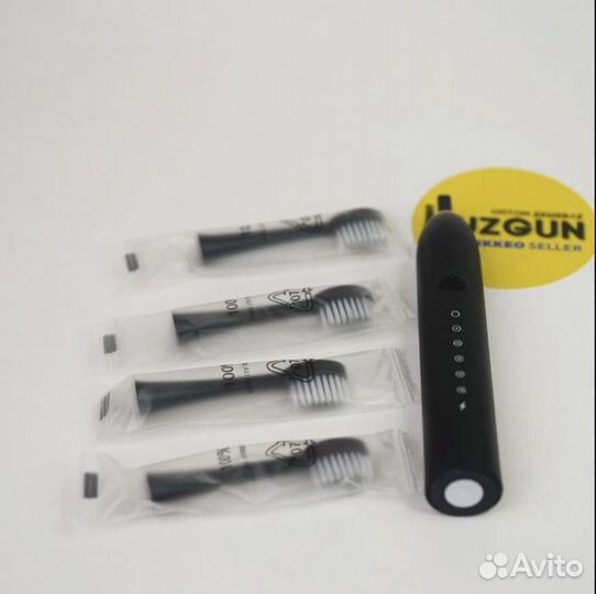 Электрическая зубная щетка