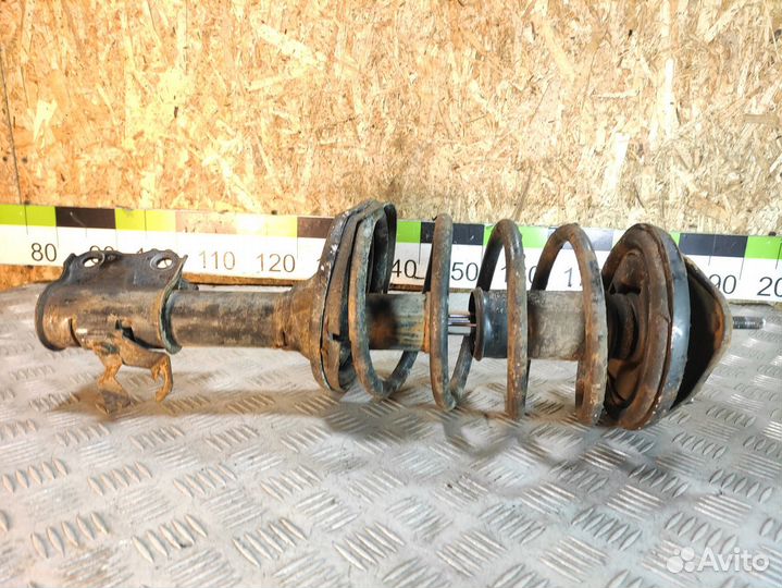 Амортизатор передний левый Mitsubishi Lancer 9