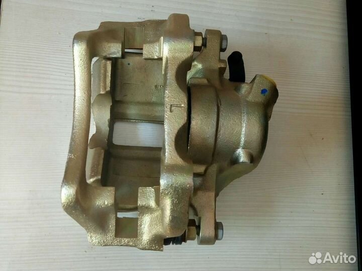 Суппорт тормозной передний левый Ch Amulet без ABC