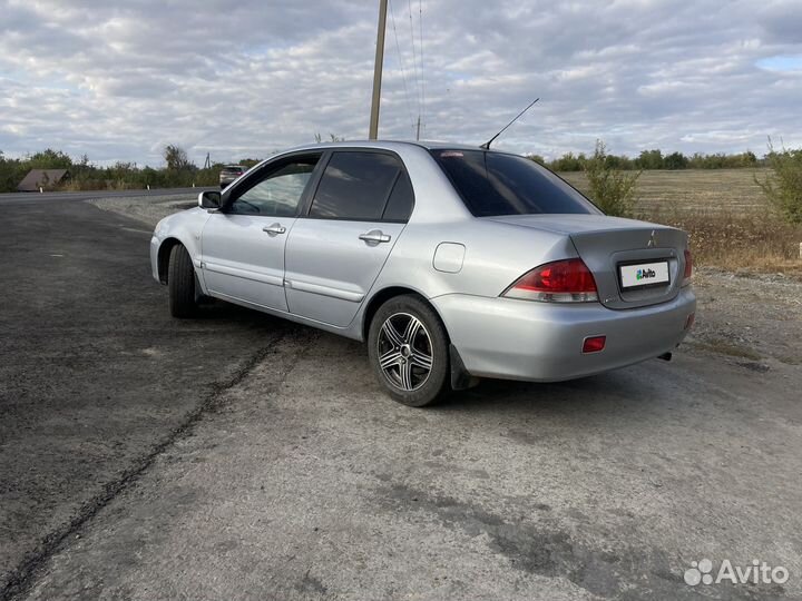 Mitsubishi Lancer 1.6 МТ, 2005, 280 000 км