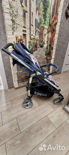 Прогулочная коляска трость