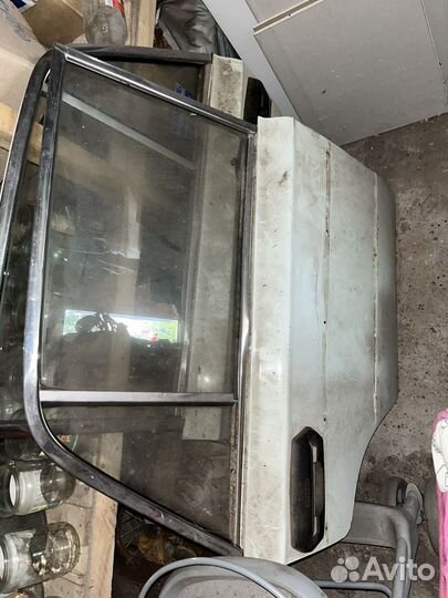 Задние двери, крышка багажника, заднее окно