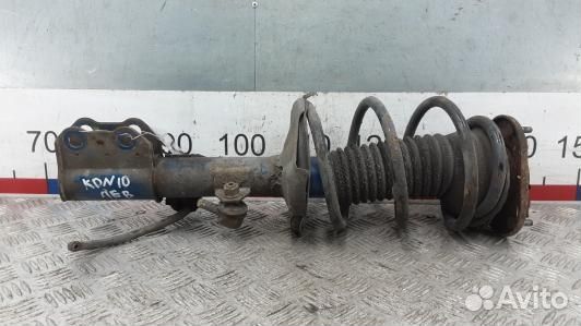 Стойка передняя левая toyota avensis T25 (KDN10K50