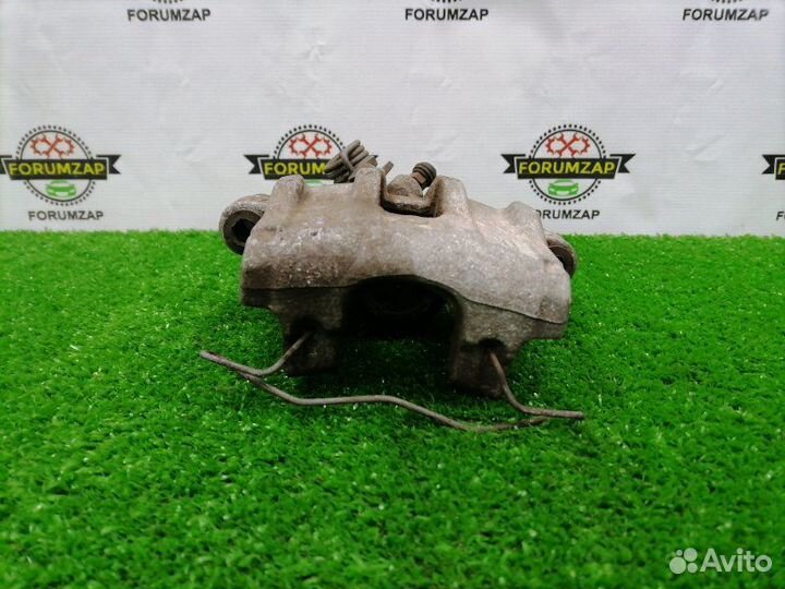 Суппорт тормозной задний левый Ford Focus