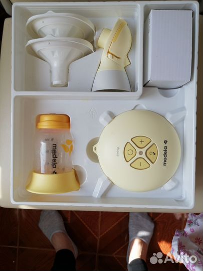 Молокоотсос medela электрический