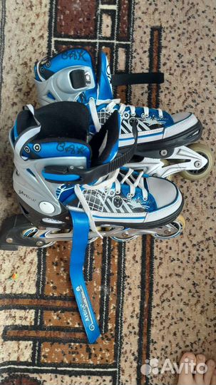 Роликовые коньки