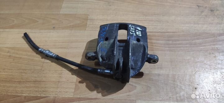 Суппорт тормозной передний левый Volvo S40I V40I