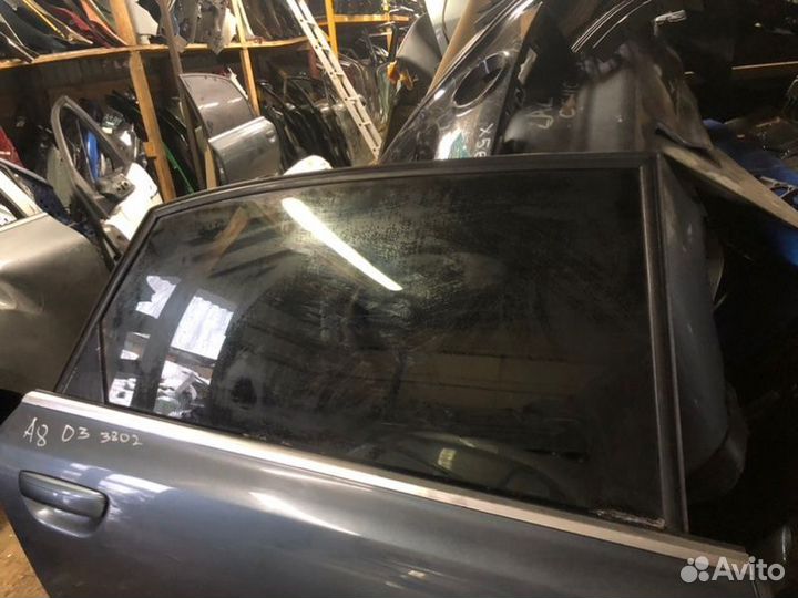 Стекло двери заднее правое Audi A8 D3