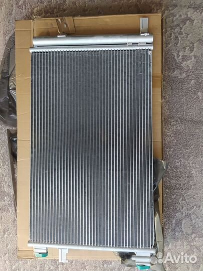 Радиатор кондиционера Opel astra j