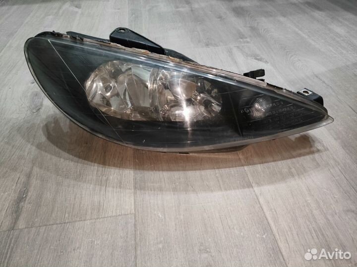 Фара правая peugeot 206