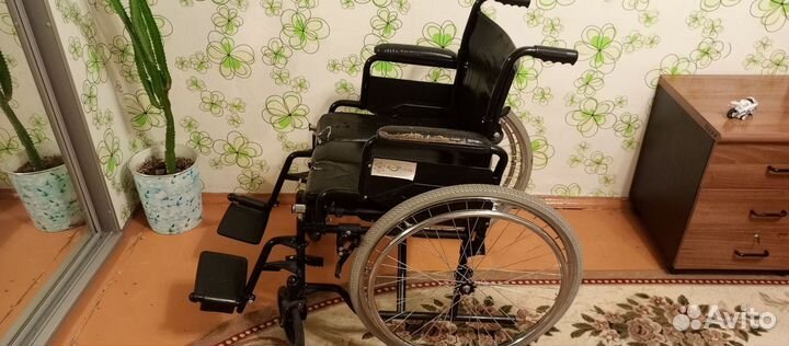 Инвалидное кресло