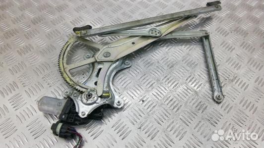 Стеклоподъемник передний левый mitsubishi L200 K4T