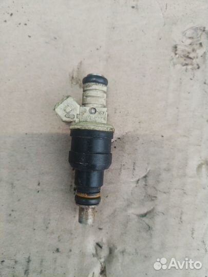 Форсунка инжекторная электрическая Opel Omega 91 г
