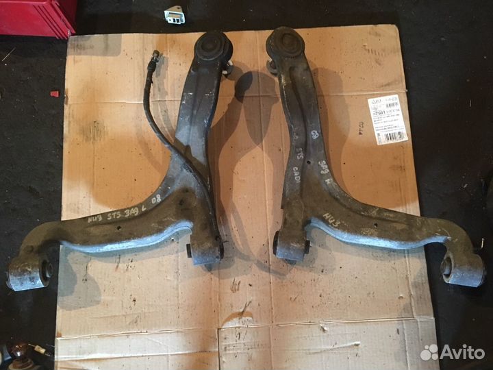 Задние нижние рычаги cadillac sts 2008 г