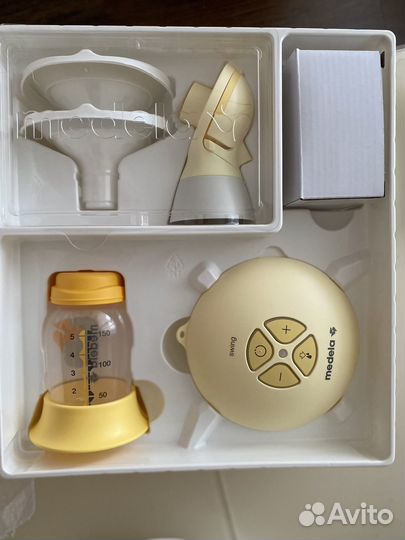 Молокоотсос medela электрический