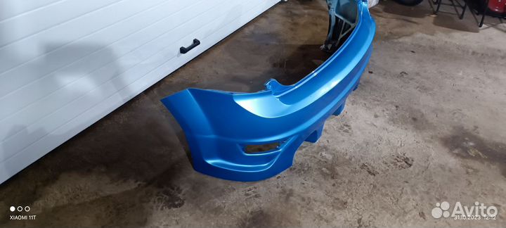 Задний бампер Форд Фокус 2 хэтчбек