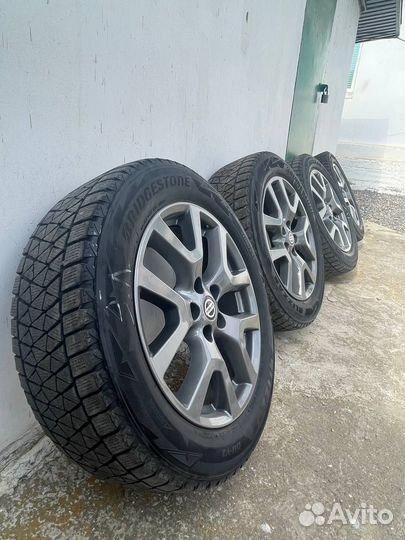 Комплект оригинальных дисков с зимней резиной