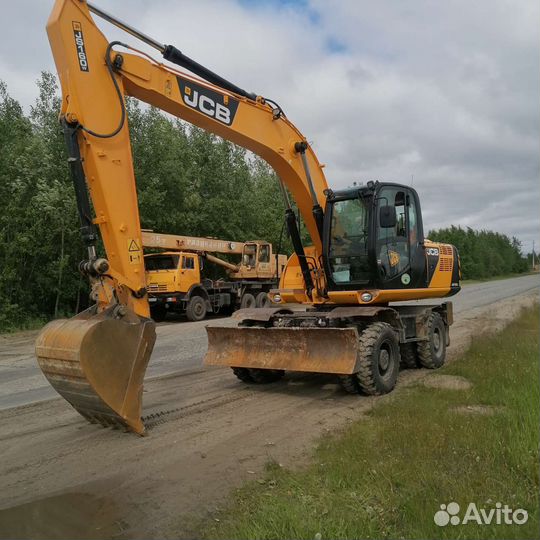 Услуги колёсного экскаватора