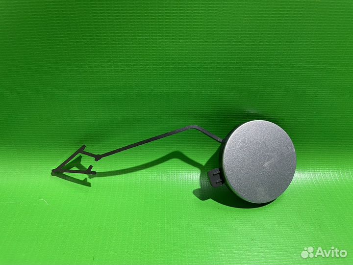 Заглушка буксировочного крюка левая Touareg 2018+