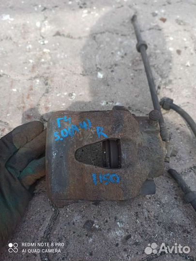 Гольф 4 суппорт передний правый оригинал