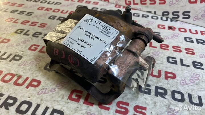 Суппорт передний BJ L 2WD б/у 323 Familia