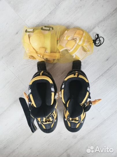 Роликовые коньки