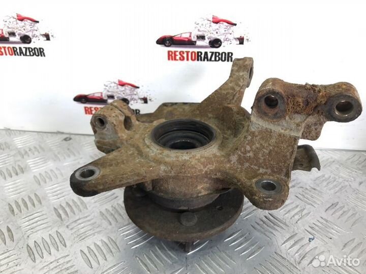 Кулак поворотный левый Kia Spectra седан S6D 2007