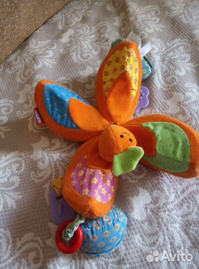 Развивающая игрушка в коляску tinylove тыковка