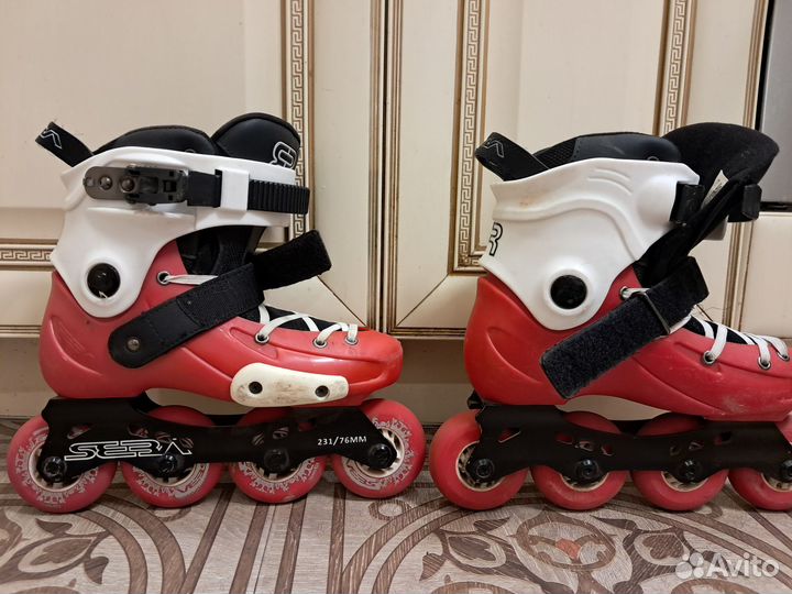 Роликовые коньки