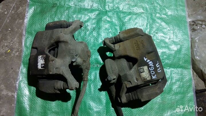 Суппорт тормозной Шевроле Кобальт передний