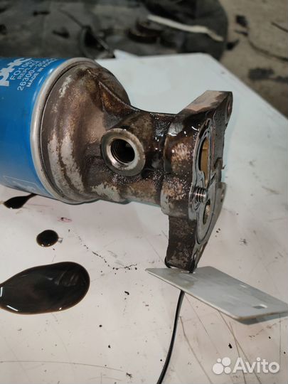 Кронштейн масленого фильтра Chevrolet Epica