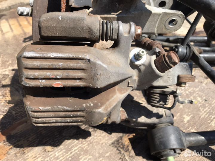 Honda Accord 7 задний левый суппорт