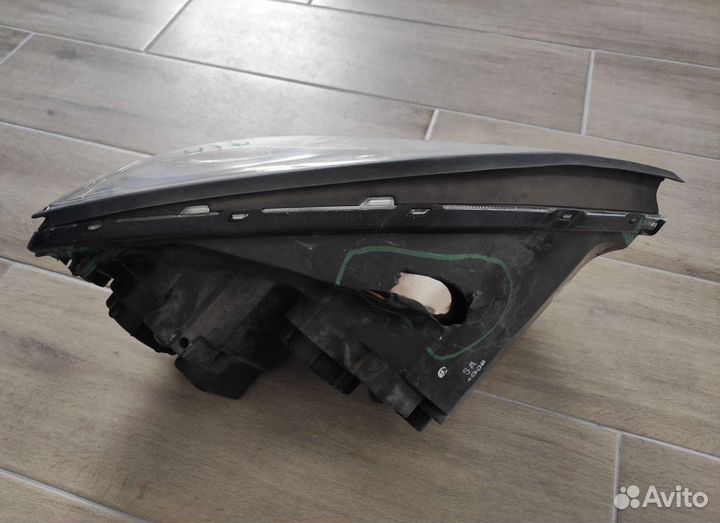 Фара левая Opel Antara